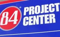 84 Lumber Doors How-To video thumbnail is the company 84 Lumber's red and blue logo with white lettering represents video of How To project for doors in your home, text on screen reads; 84 PROJECT CENTER (video production by Merging Media).