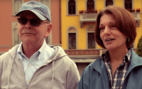 Perillo Tours Italy Testimonials captures a good looking older couple taking a break from touring Italy to comment on their amazing Italian tour provided by Perillo Tours (video production by Merging Media).