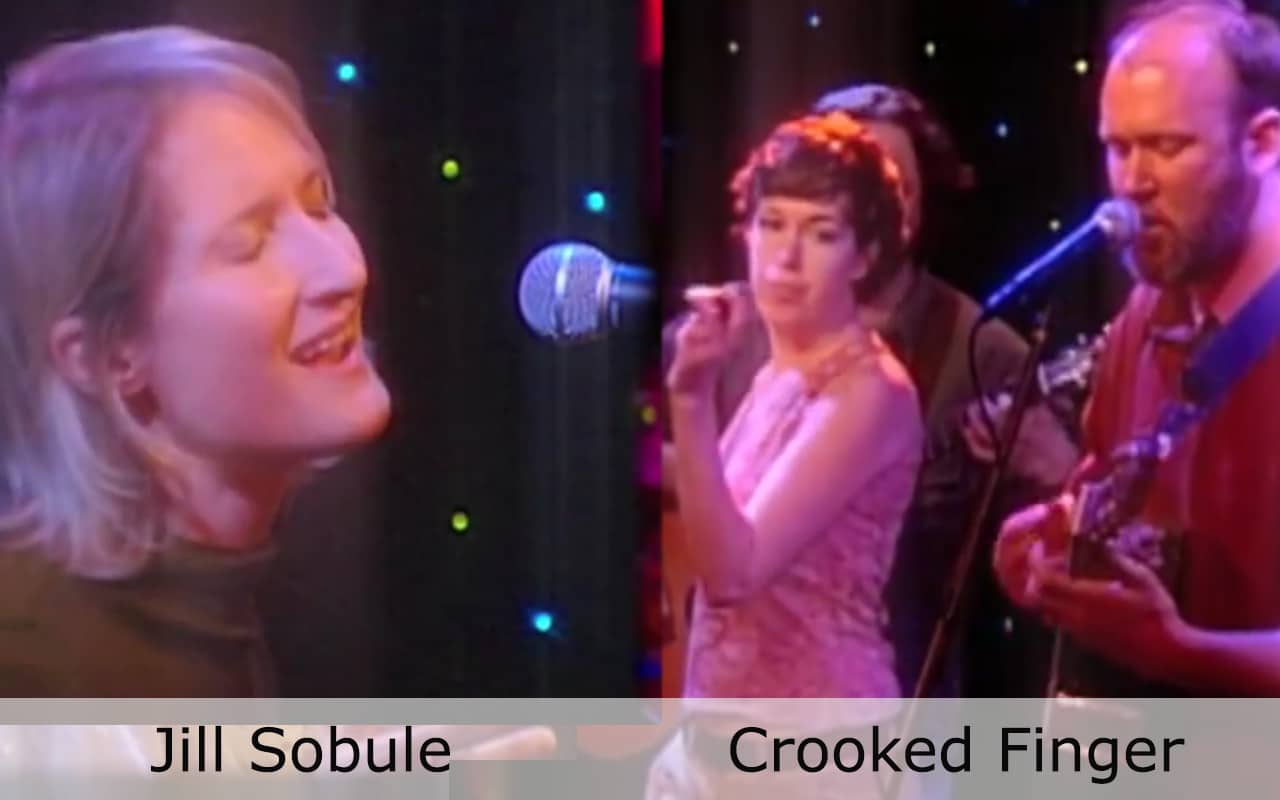 Live at Club Cafe Episode 6 features split screen of two musical artists in action, Jill Sobule on the left while Crooked Finger is on the right, performing on the stage of Club Cafe in Pittsburgh, Pennslyvania (video production by Merging Media).