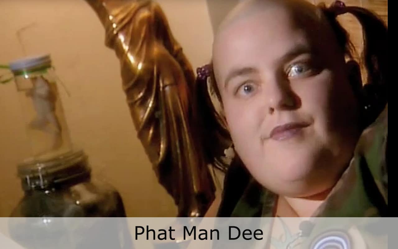 Club Cafe Phat Man Dee video thumbnail jazz vocal artist, Phat Man Dee, known for her larger than life attire, stage presence and even larger voice, performs on the Club Cafe stage in Pittsburgh, Pennsylvania (video production by Merging Media).